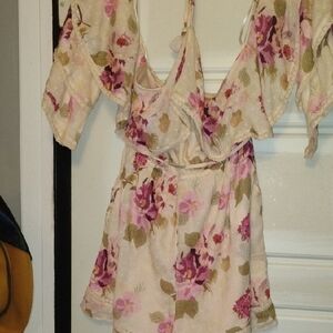 Floral Off-Shoulder romper dress with halter top tie and fringe tassle string.